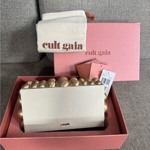 Cult Gaia Yadira Ivory and Gold Clutch
